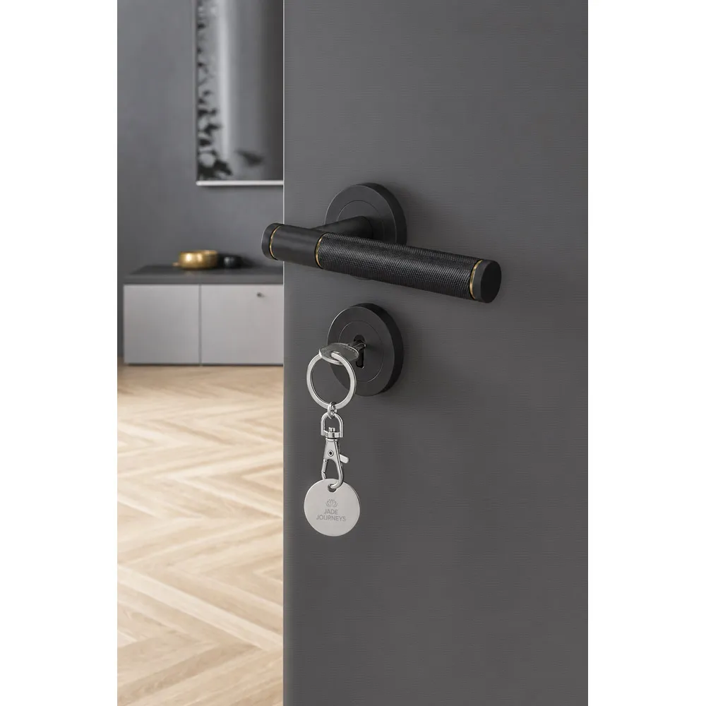 FIDO. Chaveiro em metal com formato de moeda